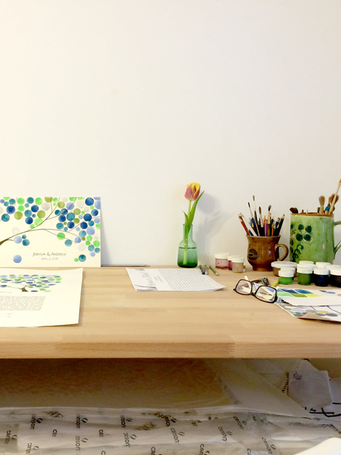 Makings of a matching guest book and ketubah - original greenery in watercolor