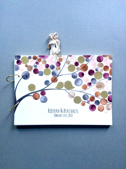Watercolor painted wedding album and guest book with gold leaf accents