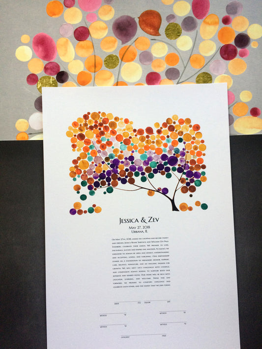 Stack of ketubah prints on our studio table